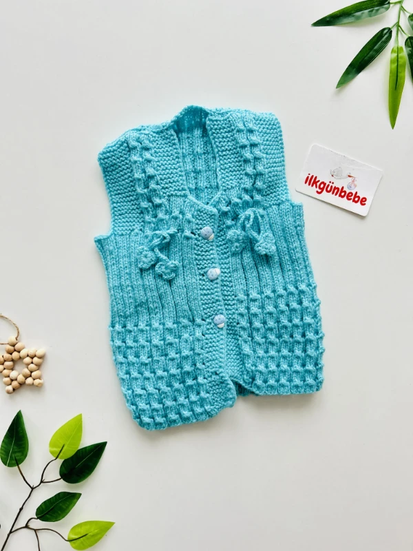  İki Şiş El Örgüsü Bebek Yeleği